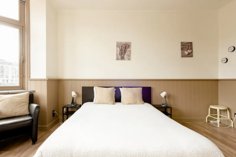Bedroom with freshly made double bed