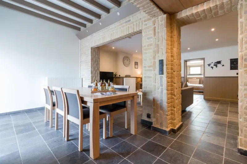 Dining area beneath the wooden beams
