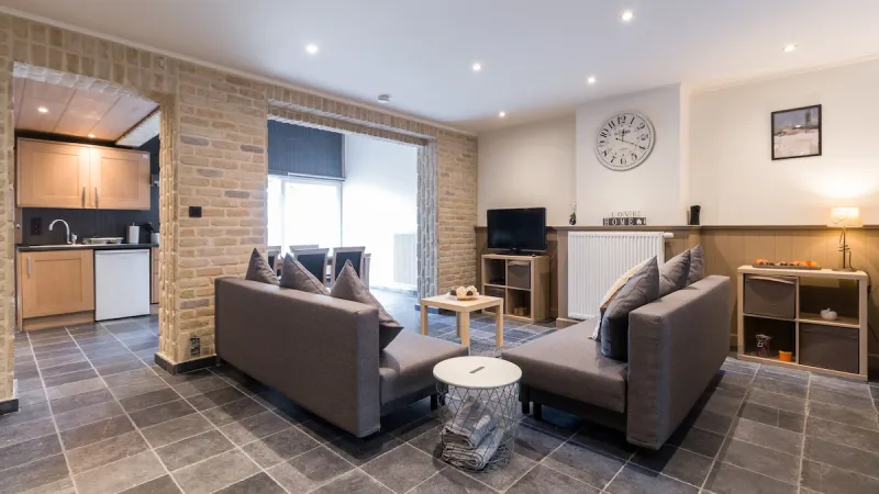 Seating area with double sofa in the Spacious Apartment