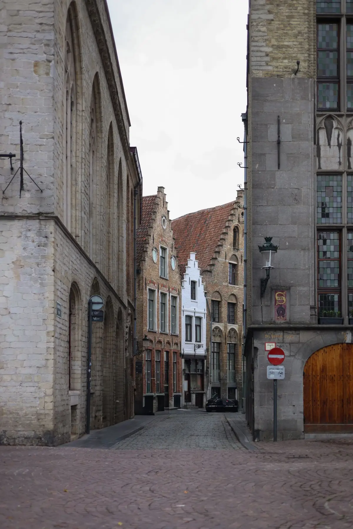 A quiet cobbled street with step gables in Bruges